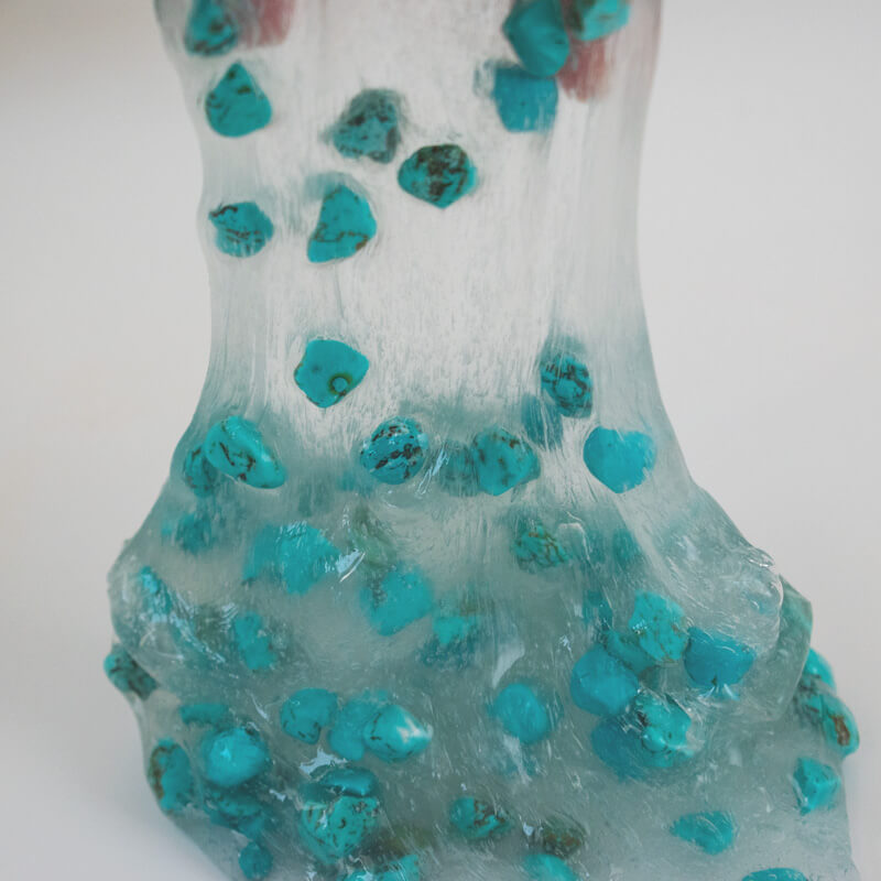 clear base with Turquoise rocks