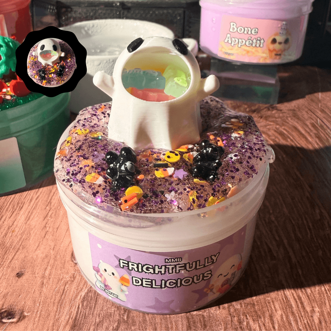 frightfully delicious halloween slime jar topped with purple glitter fimo bomb and white ghost charm