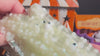 Guess How Many Eyes-slush bead filled green thick clear slime demo video