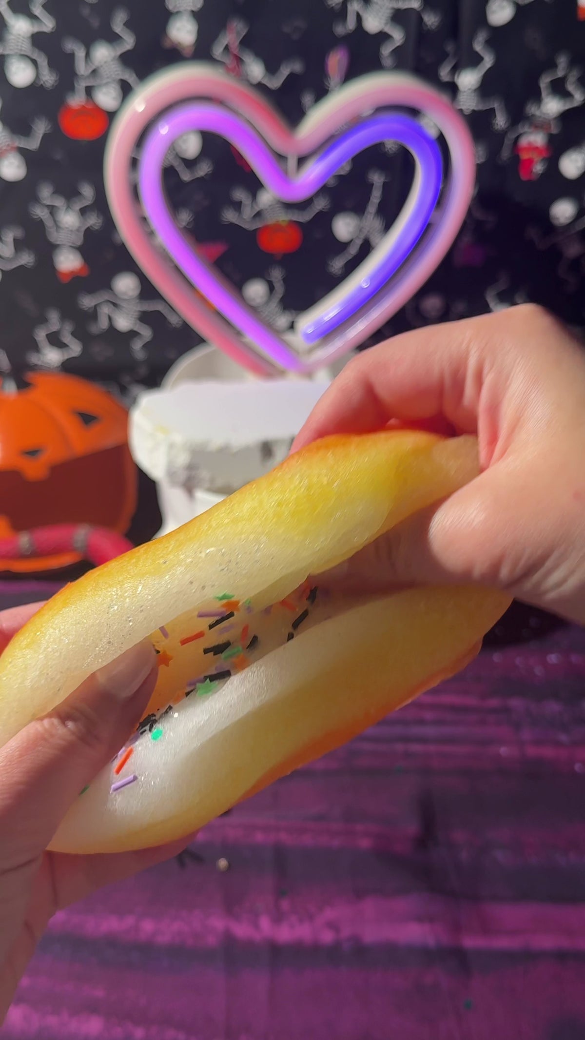 slime asmr of sweet candy kisses tri-color icee slime in orange, yellow, and white 